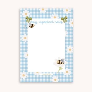 May include: A notepad featuring a light blue gingham design, white daisies, and illustrations of bees and green bows. The text "very important notes" is displayed at the top. The bottom of the notepad has the text "lunamise.com".