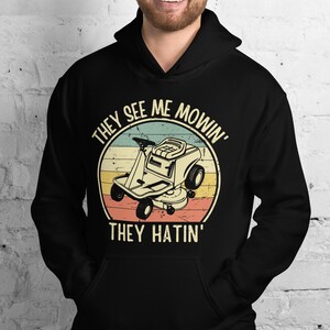 They see me mowing they hatin Hoodie, lawn mowing hoodie, Gift For Landscaper, Garden Lover Hoodie, Landscaping Hoodie