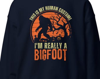 ビッグフットのハロウィンスウェットシャツ、ビッグフットのハロウィンコスチュームシャツ、サスカッチスウェットシャツ、ビッグフットのギフト、ビッグフットのおもしろシャツ、ユニセックススウェットシャツ