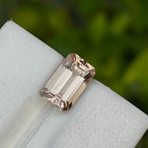 Rare Natural Imperial Topaz, 2.45 carats / loop Clean / peach / emerald cut .