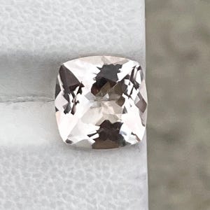 Rare Natural Imperial Topaz, 2.00carats / loop Clean / light peach / cushion shape.