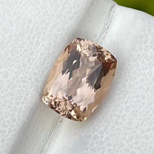 Rare Natural Imperial Topaz, 3.90 carats / loop Clean / peach / cushion shape.