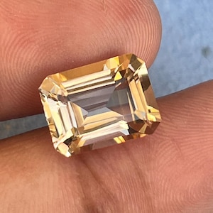 May include: A set of three ceramic mugs with a speckled, matte finish in cream, light brown, and dark brown. Each mug has a simple, minimalist design, ideal for tea or coffee.