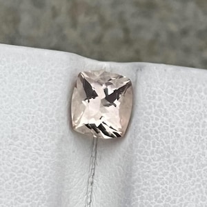 Rare Natural Imperial Topaz, 1.75carats / loop Clean / peach / cushion shape.