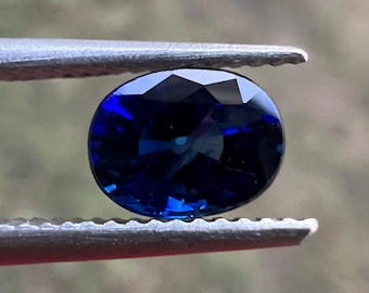 Natural Heated Blue Sapphire: Oval Gemstone, 0.65 Carat (5.6x4.3x3.05mm)