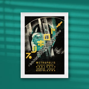 May include: A vintage Japanese movie poster for the film "Metropolis" featuring a stylized image of a woman's face with the title in gold lettering.