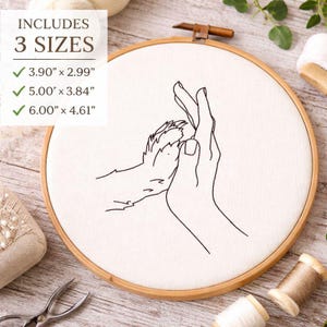 Diseño de bordado a máquina de mano humana y pata de perro