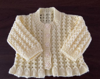 Hand knitted girl’s cardigan in various sizes and colours