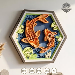 May include: A layered, hexagonal wall art piece featuring two orange koi fish swimming in a blue pond with green lily pads. The artwork has a gray frame and includes the text "Swastik Designs Crafts" and file type icons.