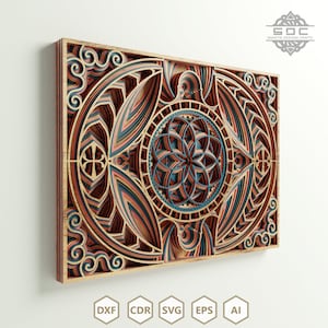 May include: Intricate laser cut wooden wall art featuring a geometric mandala design with blue, red, and brown colours. The design is layered and creates a 3D effect.