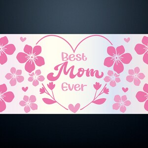 May include: Pink floral design with a heart shape and the text "Best Mom Ever" in a white background.