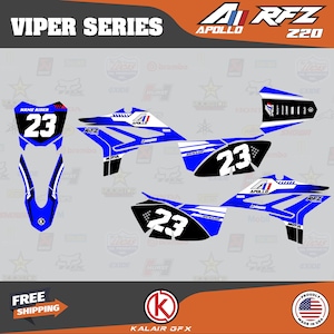 May include: A set of blue and white Viper Series motorcycle decals with the number 23. The decals include the Apollo and RFZ logos, and the text "Name Rider". The design features black accents and the Dunlop logo.