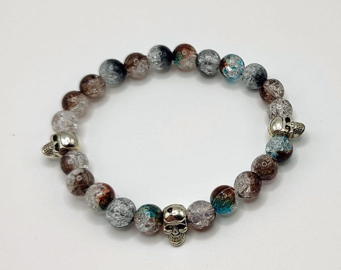 Crystal Effect Bead Bracelet with Tibetan Silver Skull Spacers.