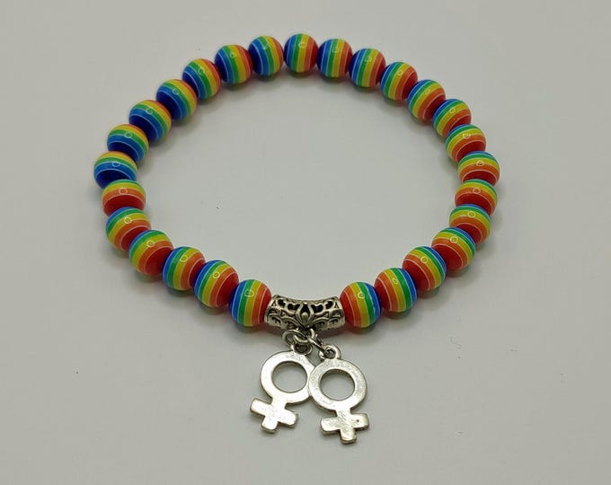 Rainbow Stripped Beaded Bracelet With Female Gender Symbols.
