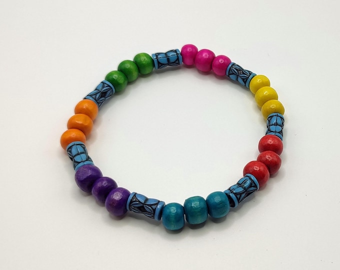 Colourful Wooden Beaded Bracelet with Carved Patterned Spacer Beads.