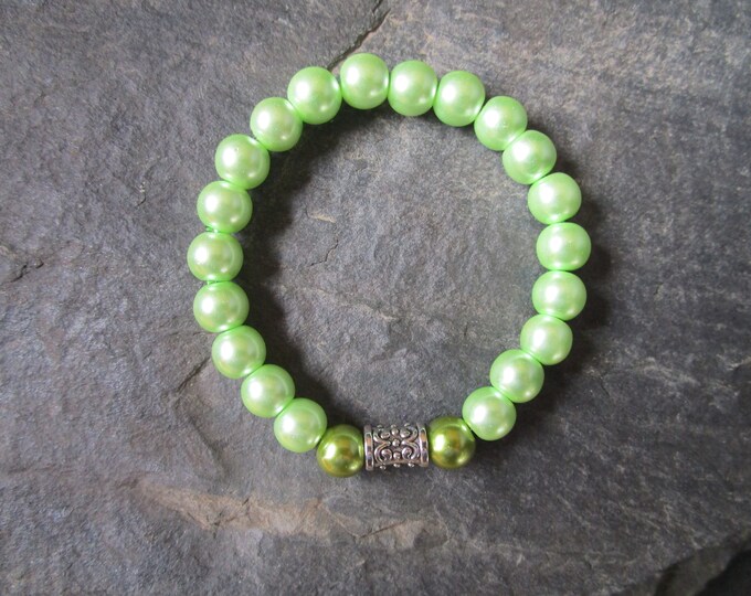 Green Glass Pearl Bead Bracelet With a Tibetan Silver Spacer