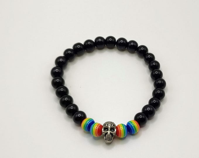 Black Beaded Bracelet With Rainbow Beads and Silver Skull Spacer.