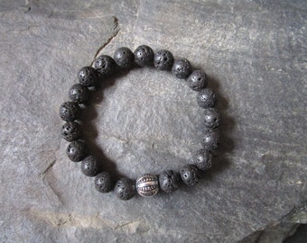 Black Lava Stone Diffuser Bracelet With a Tibetan Silver Spacer Bead