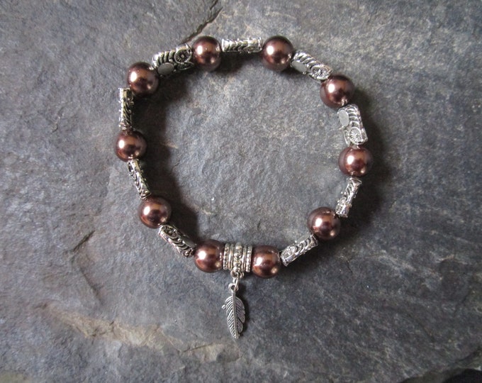 Mocha Glass Pearl Bead Bracelet With Silver Feather Charm and Silver Owl Spacers
