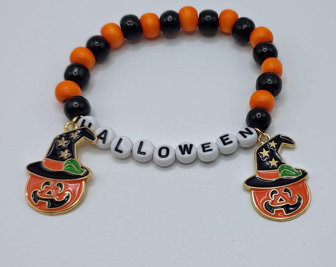 Black and Orange Halloween Bracelet with Two Pumpkin Witch Hat Charms.