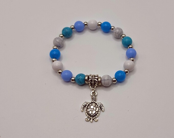 Turquoise, White and Blue Ocean Themed Bracelet with Tibetan Silver Spacers and a Turtle Charm.