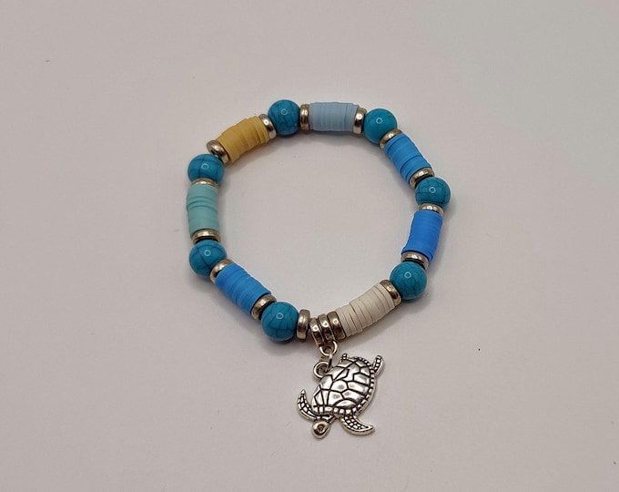 Turquoise, White and Blue Ocean Themed Bracelet with Tibetan Silver Spacers and a Turtle Charm.