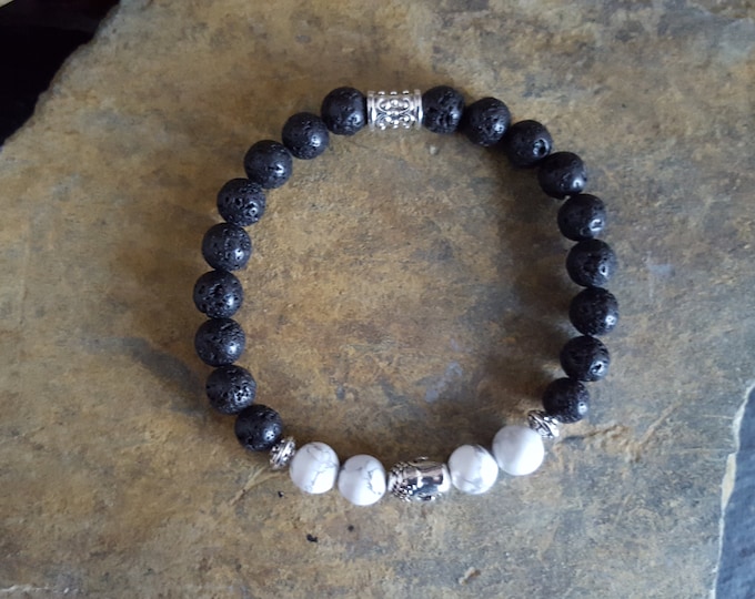 White Howlite Semi-Precious Gemstone and Black Lava Stone Diffuser Bracelet With a Tibetan Silver Buddha Head
