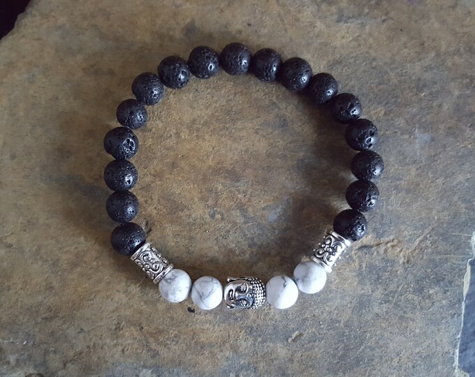 White Howlite Semi-Precious Gemstone and Black Lava Stone Diffuser Bracelet With a Tibetan Silver Buddha Head