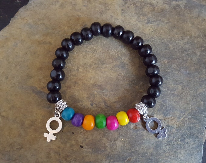 Black and Rainbow Wooden Bead Bracelet with Female Gender Symbols