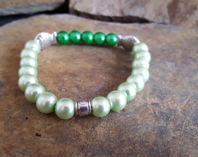 Green Glass Pearl Bead Bracelet With Silver Fish Spacer