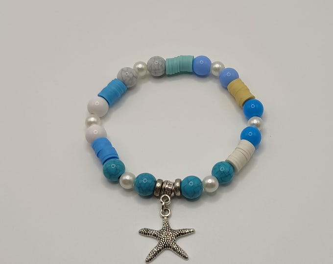Turquoise, White and Blue Ocean Themed Bracelet with Tibetan Silver Spacers and a Starfish Charm.