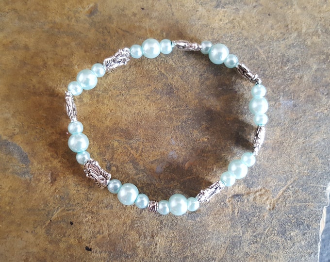 Pale Blue Glass Pearl Bead Bracelet With Silver Elephant Spacers