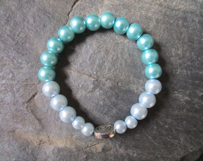 Turquoise and  Pale Blue Glass Pearl Bead Bracelet With a Tibetan Silver Hero-Heart Spacer