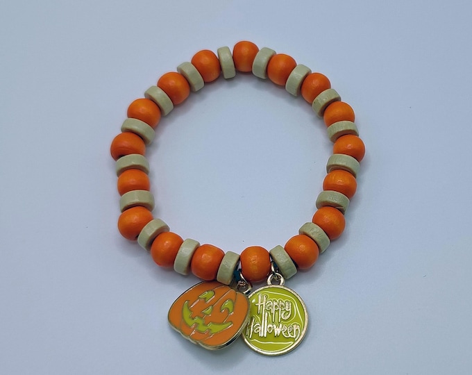 Orange and Cream Halloween Wooden Bead Bracelet with Pumpkin and Happy Halloween Charms.