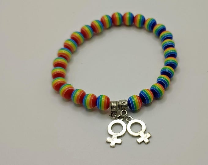 Rainbow Stripped Beaded Bracelet With Female Gender Symbols.