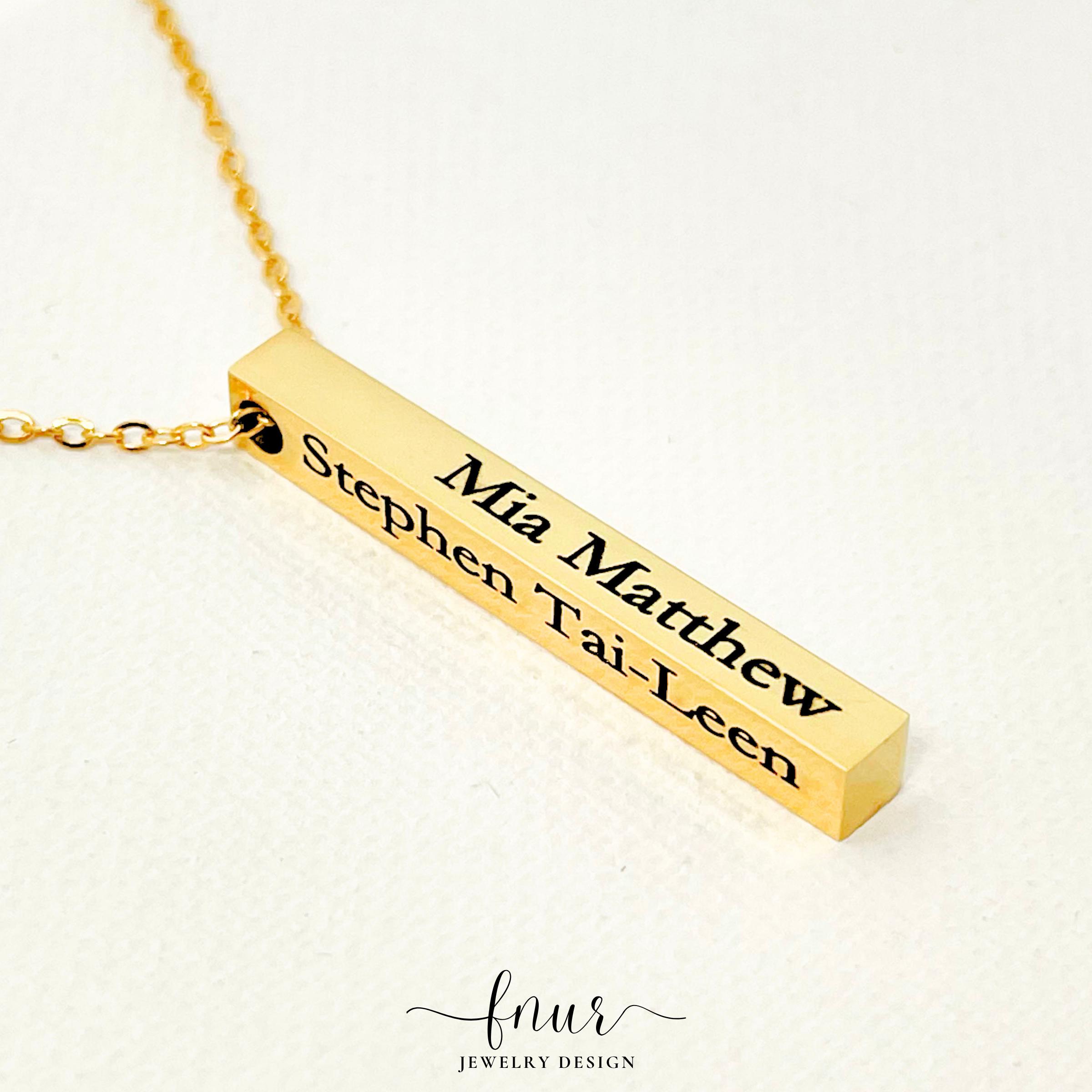 silver bar necklace worn by model demonstrating sophisticated length and minimalist everyday style