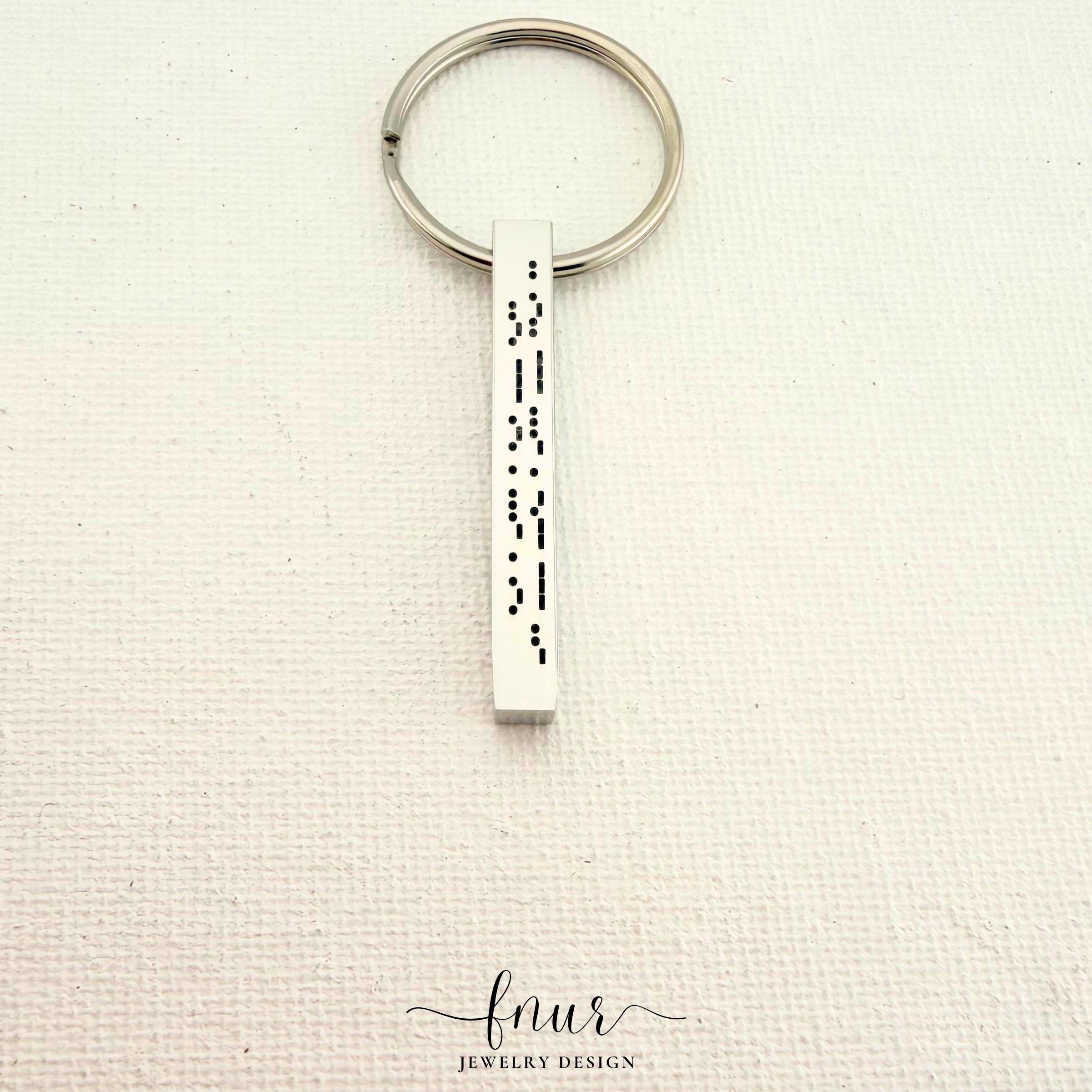 front view of polished stainless steel personalized morse code bar keychain for everyday use