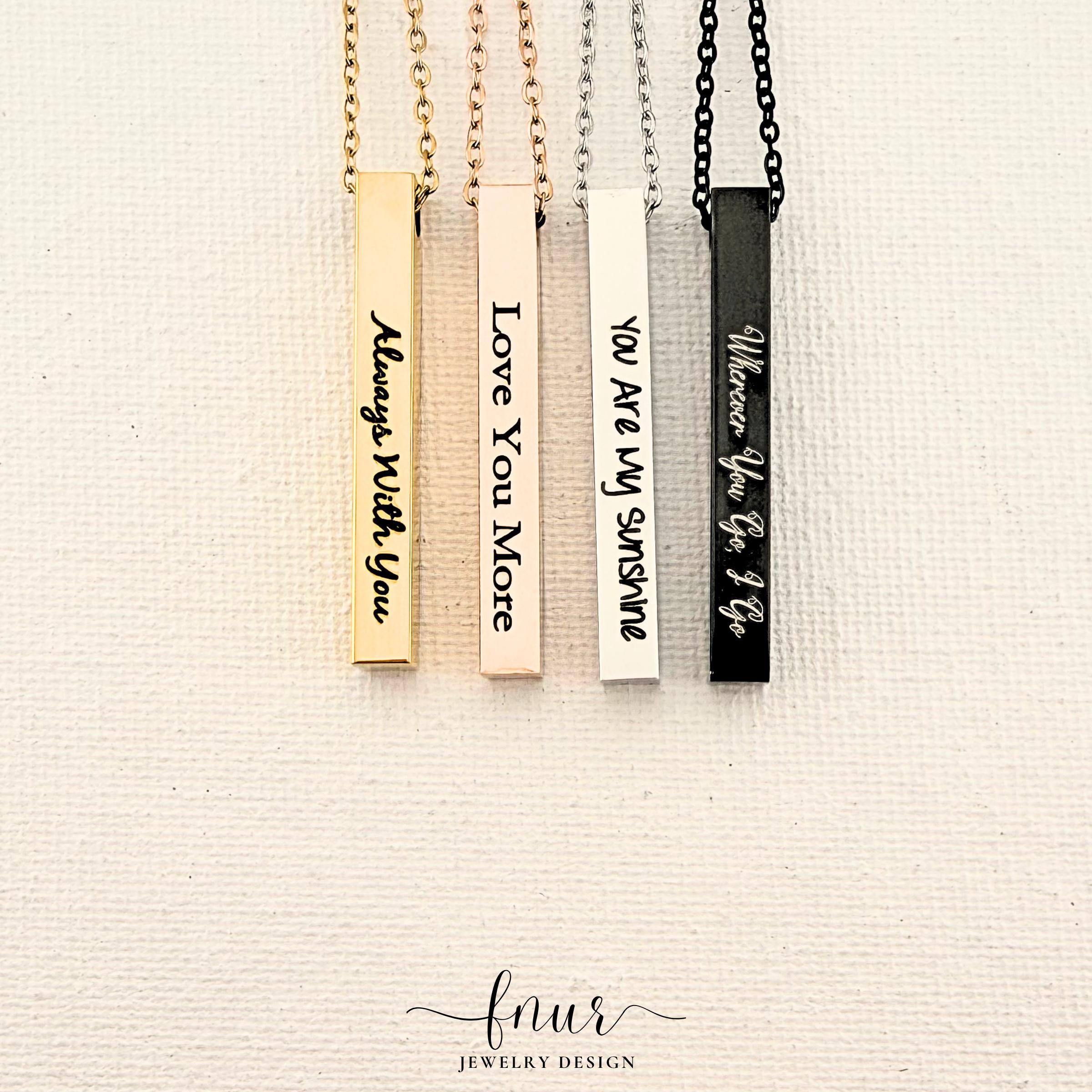 elegant gold finish 4-sided bar necklace showing intricate custom coordinate engraving detail on side