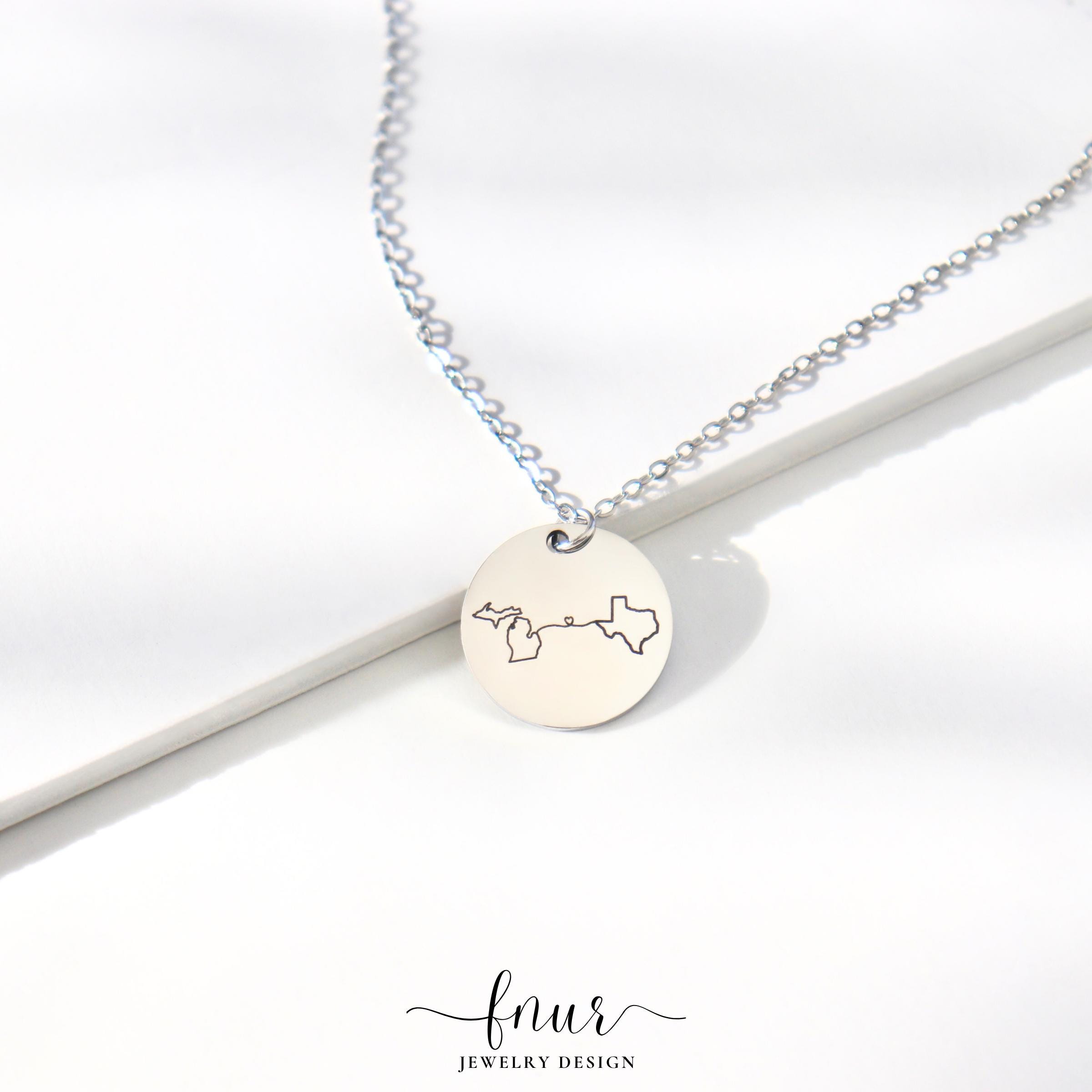 flat lay photography of handmade jewelry gift set including necklace and personalized keepsake note