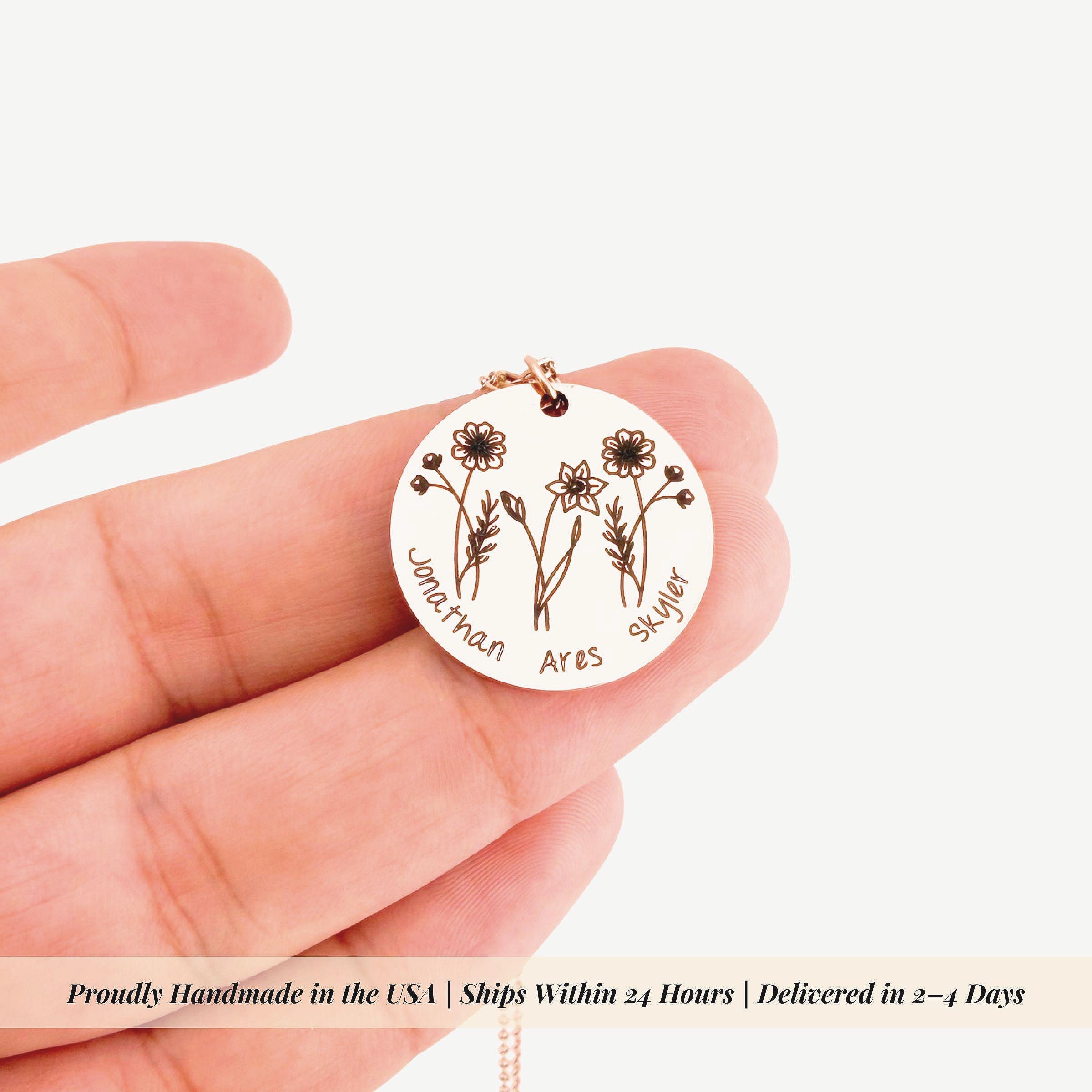 Close up view of intricate floral engraving on custom birth month flower pendant