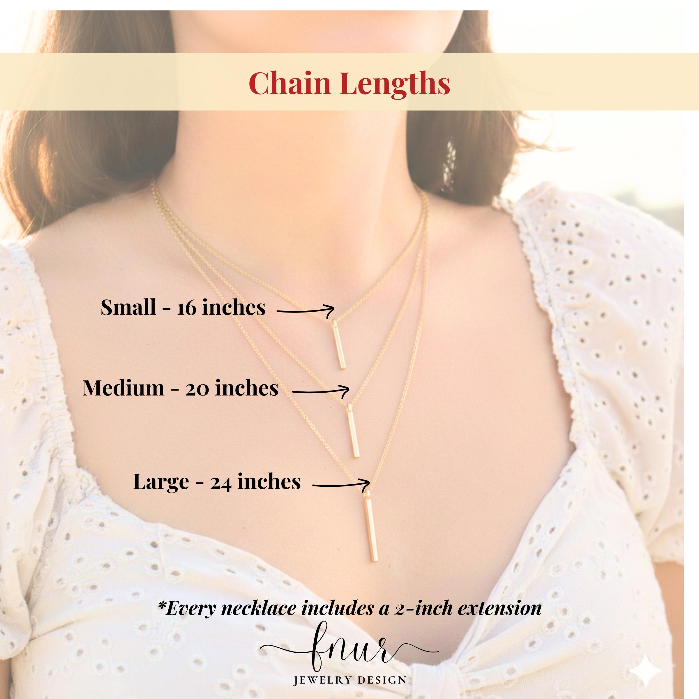 lifestyle shot of woman wearing layered custom name necklace with casual chic outfit aesthetic