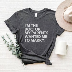 I'm The Doctor My Parents Wanted Me To Marry, Doctor Shirt, Doctorate Shirt, PHD Graduation Gift, New Doctor Gifts, Medical School Graduate