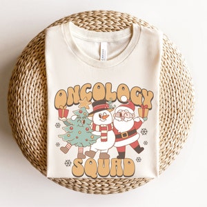 Oncology Christmas Shirt, Oncology Squad Shirts, Oncology Nurse Shirt, Oncology Nurse Holiday Shirts, Onc CNA Shirts, Oncology Tech T-Shirts