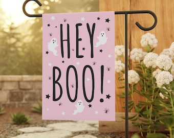 May include: Pink Halloween garden flag with the text "Hey Boo!" in black lettering. The flag is decorated with white ghosts and black stars and spiders.
