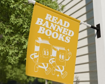 May include: A yellow flag with the text "READ BANNED BOOKS" in white. Two cartoon book characters are walking side-by-side.
