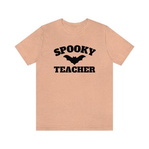Spooky Teacher Shirt, Halloween Teacher Shirt, Fall Teacher Shirt, Halloween Class Party Shirts, Trick Or Teach Tshirt, Teaching Team Shirts Heather Peach