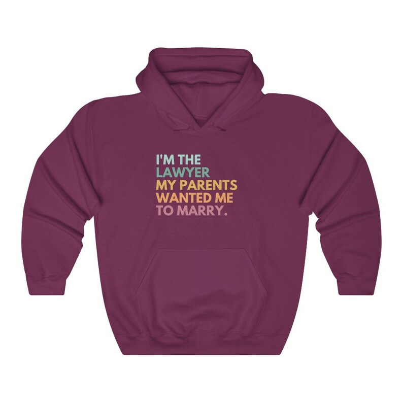 May include: Burgundy hooded sweatshirt with the text "I'm the lawyer my parents wanted me to marry."
