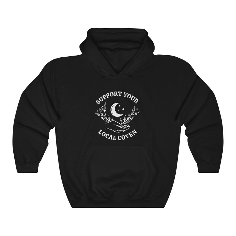 May include: Black hooded sweatshirt with a white graphic design that says "Support Your Local Coven" with a crescent moon and stars.