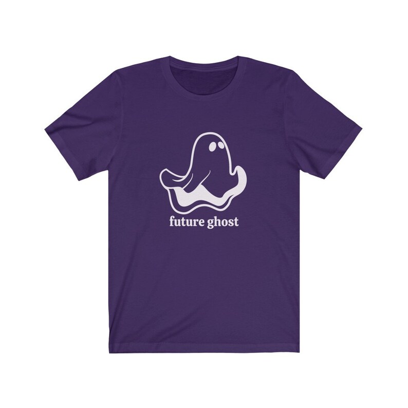 May include: Purple short-sleeved t-shirt with a white ghost graphic and the text "future ghost" printed on the front.