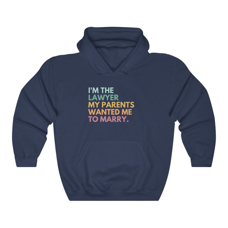 May include: Navy blue hooded sweatshirt with the text "I'm the lawyer my parents wanted me to marry."